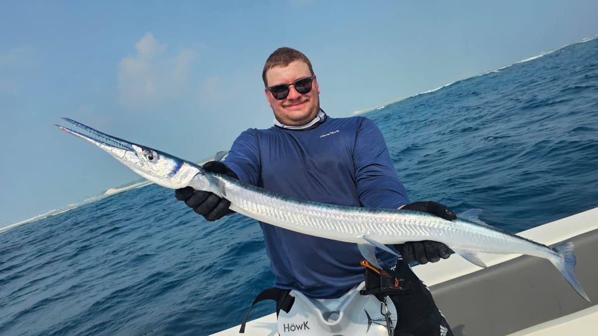 Offshore anglers holding a large catch